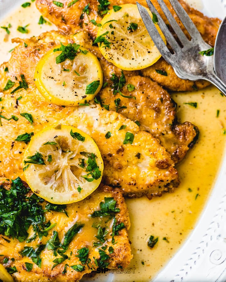 Chicken Francese in white serving platter.