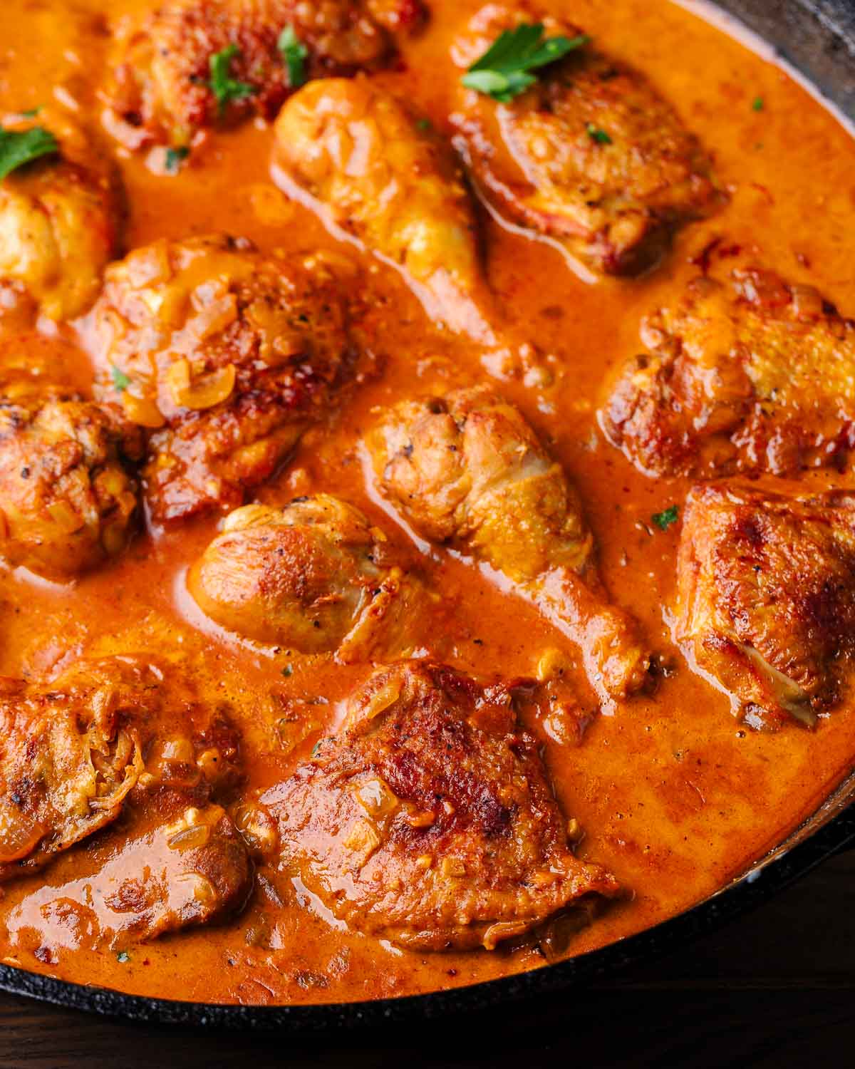 Chicken paprikash in cast iron pan.