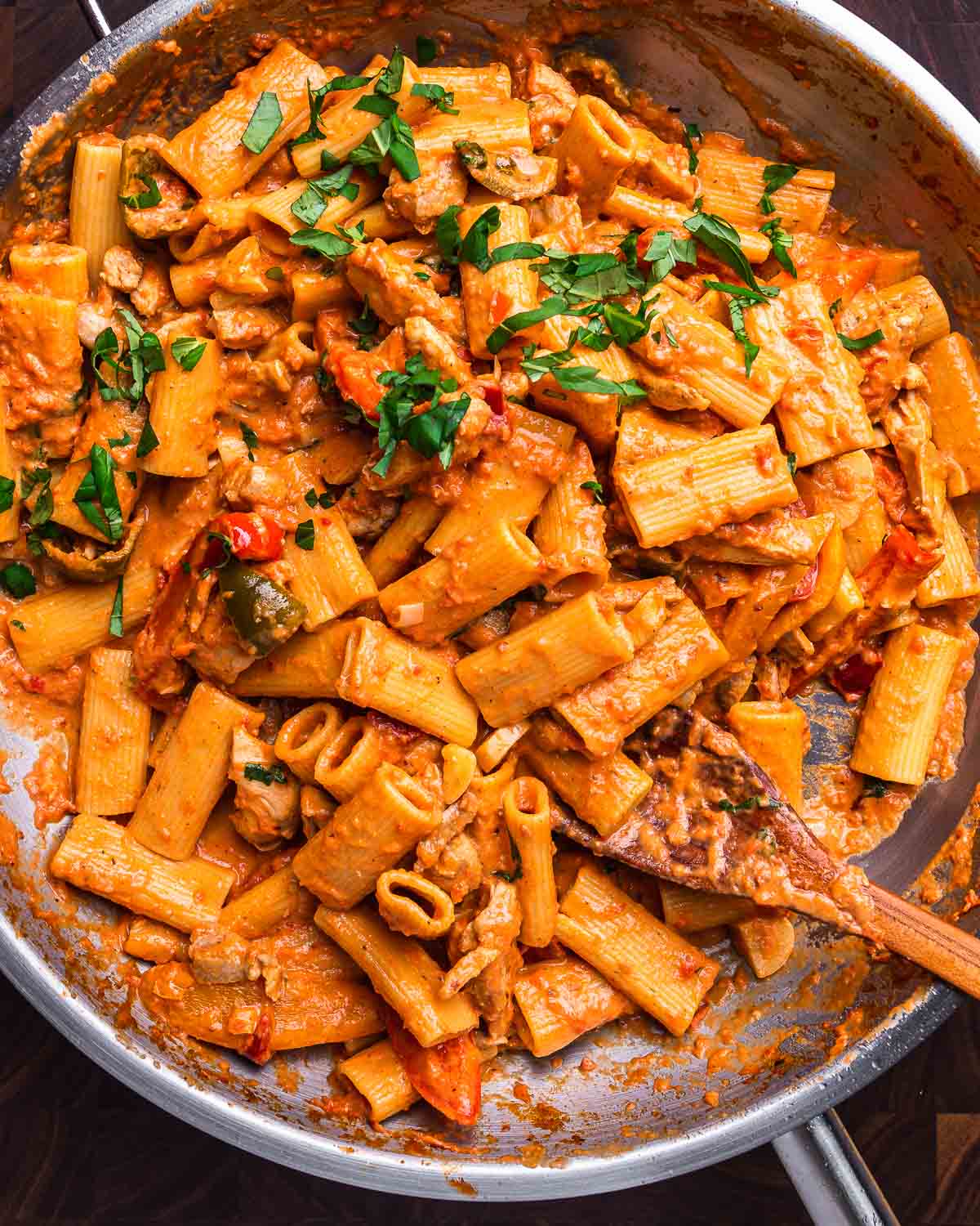 Chicken riggies in large stainless steel pan.