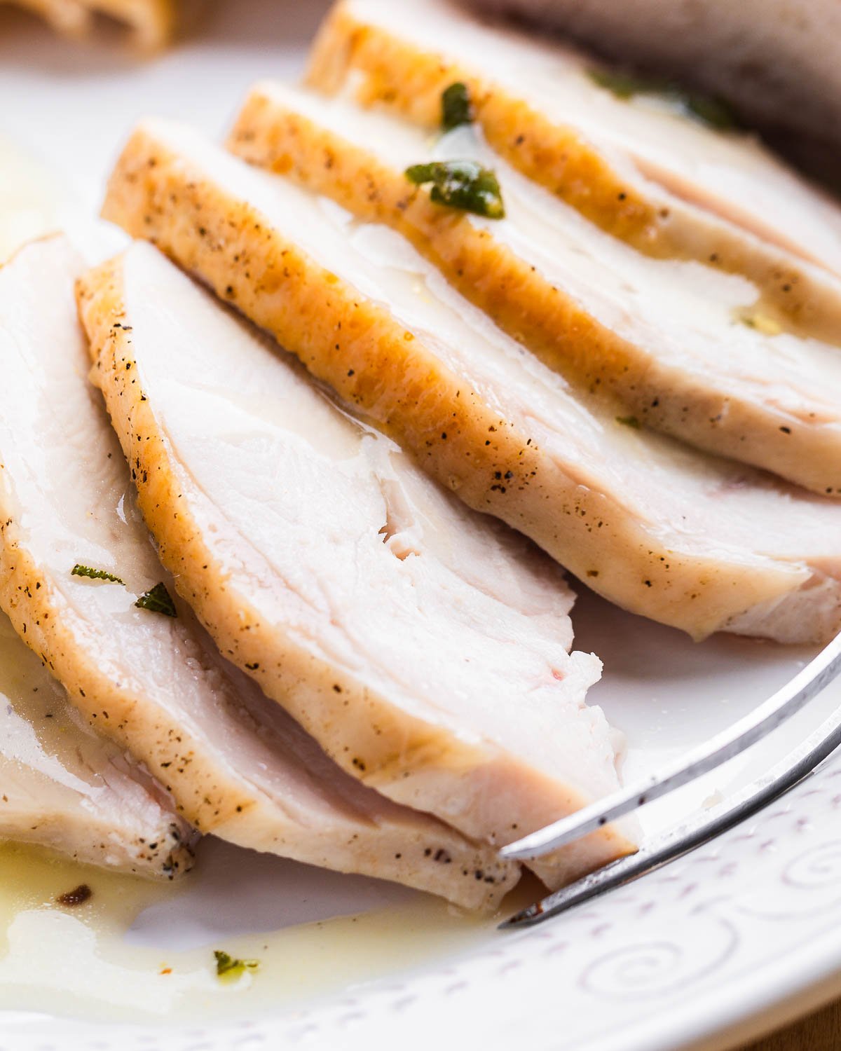 Close up shot of sliced turkey breast pieces.