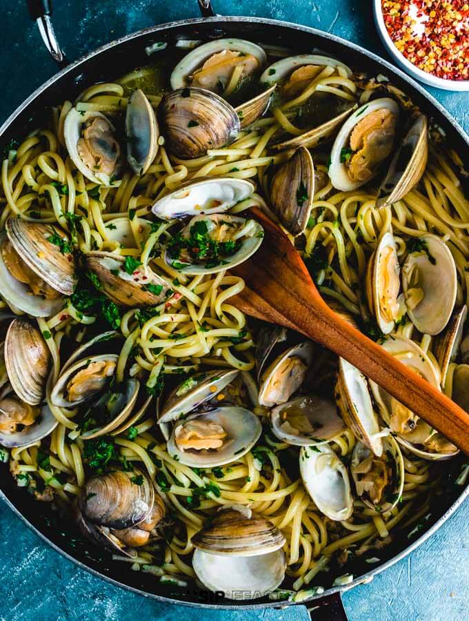 Liguine alle vongole in pan finished shot.