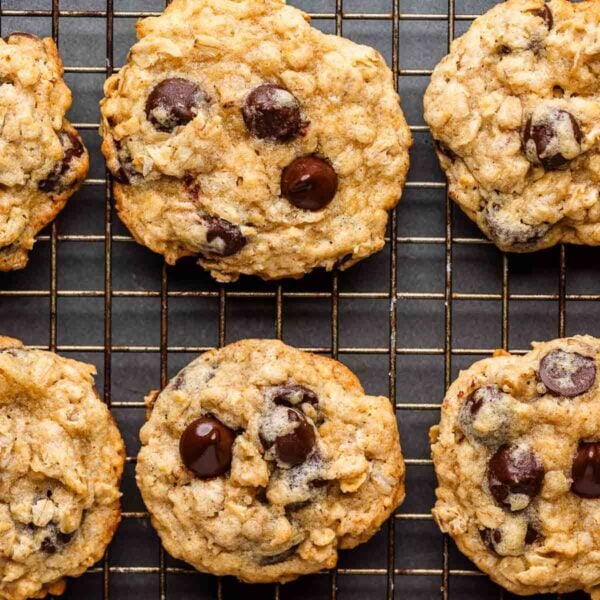 Oatmeal chocolate chip cookies on wire rack for featured image.