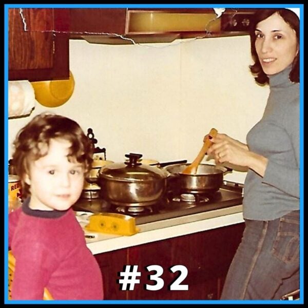 Old photo of Jim and his mother in the kitchen.